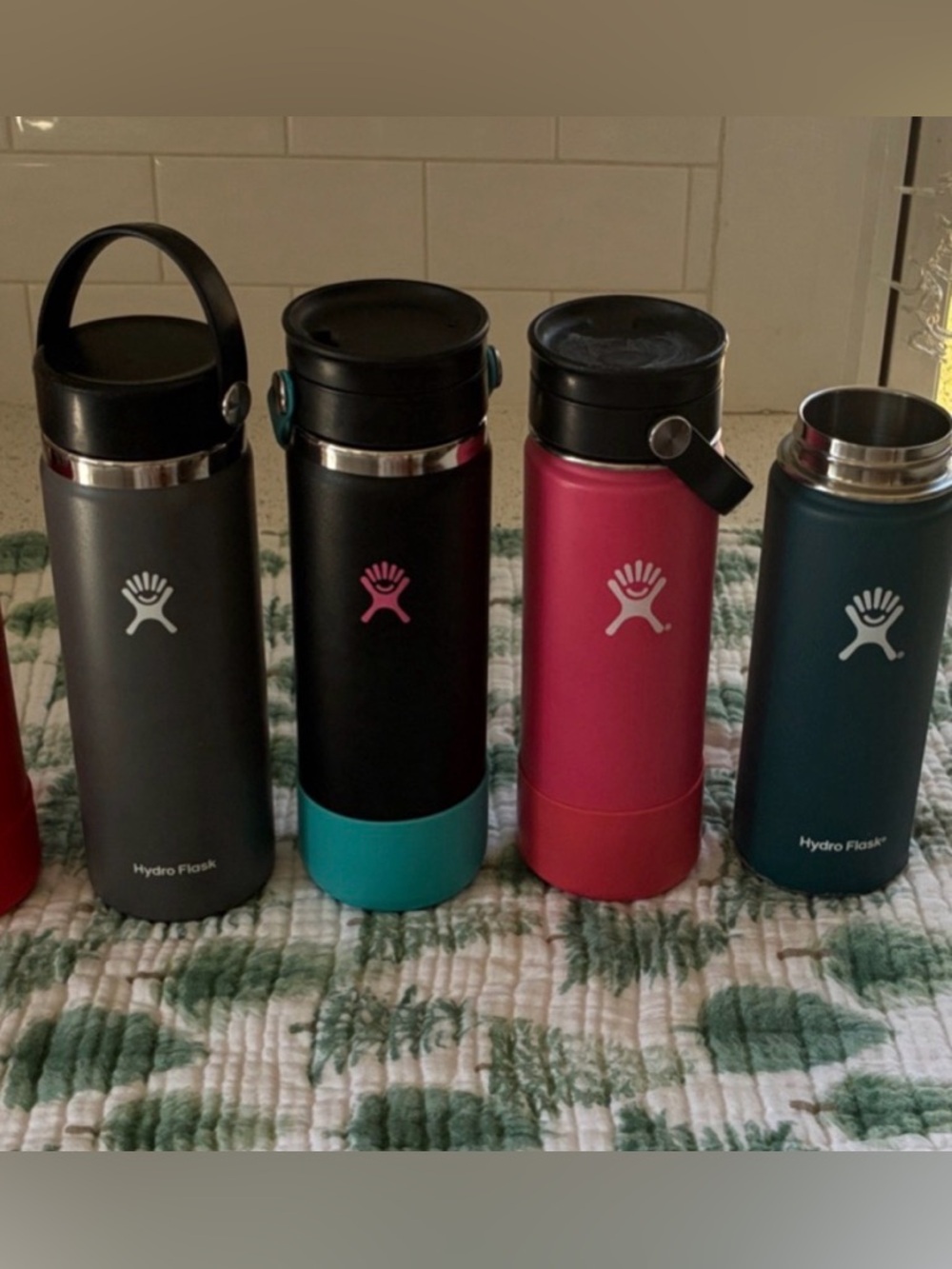 4 Hydro Flasks in Mixed Colors -20 amd 18 oz. Accessories included.